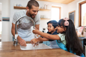 a family washing hands